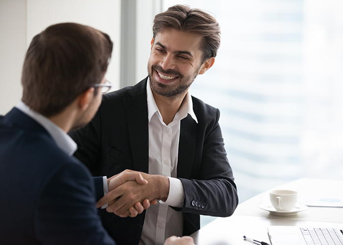 Two men shaking hands